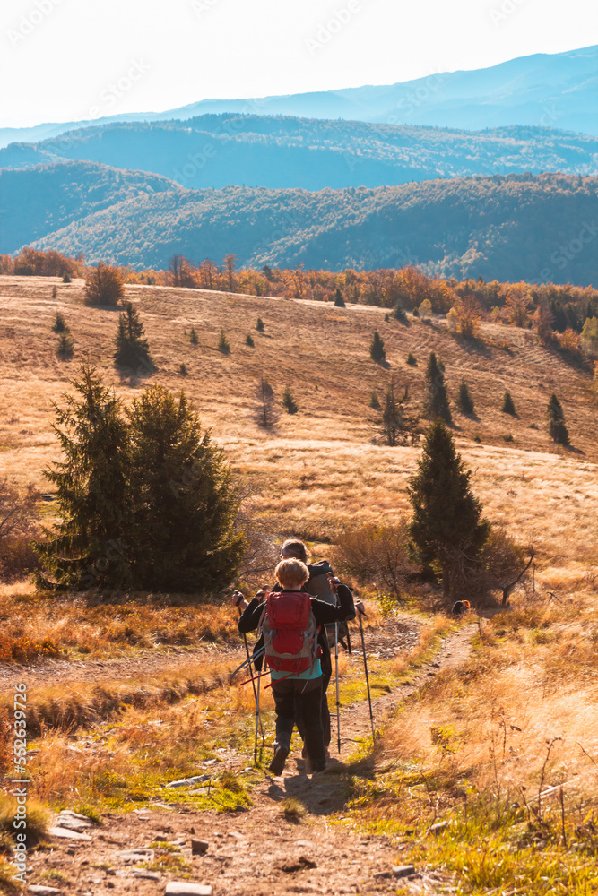 Active senior people are hiking at the autumn morning mountains Active senior people are hiking at the autumn morning mountains