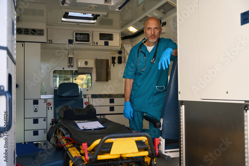 Emergency medical worker is preparing to receive a patient