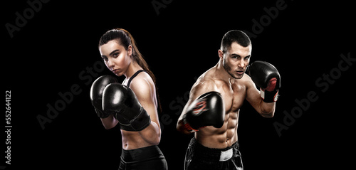 Boxing concept. Sports betting. Design for a bookmaker. Download banner for sports website. Two boxers isolated on a black background.