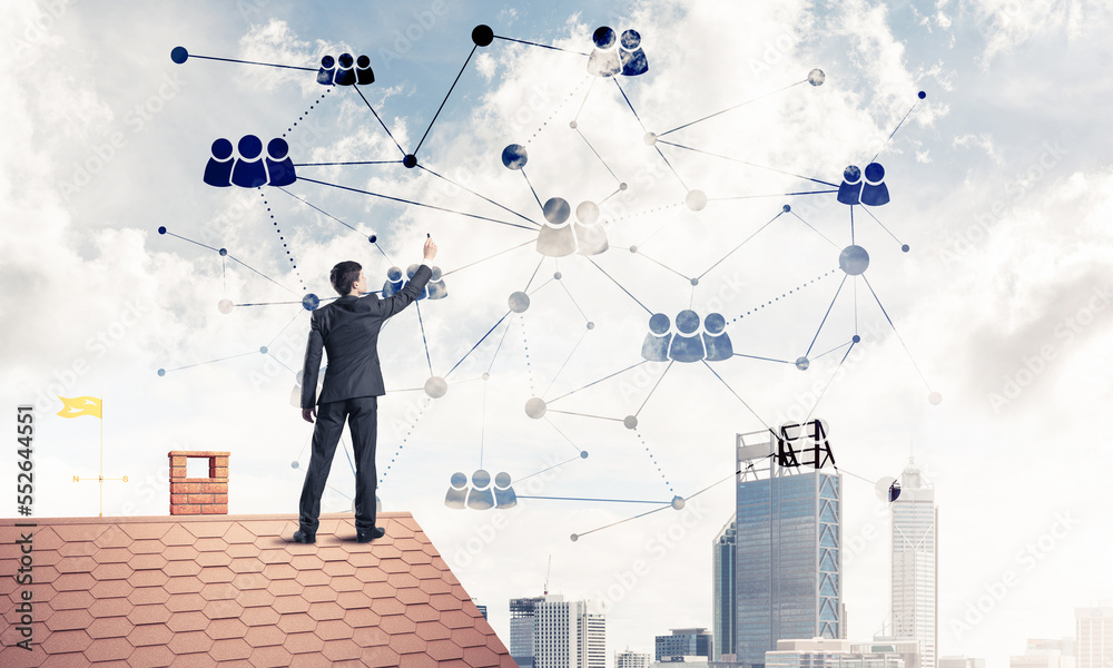 Businessman on house roof presenting networking and connection c Businessman on house roof presenting networking and connection c