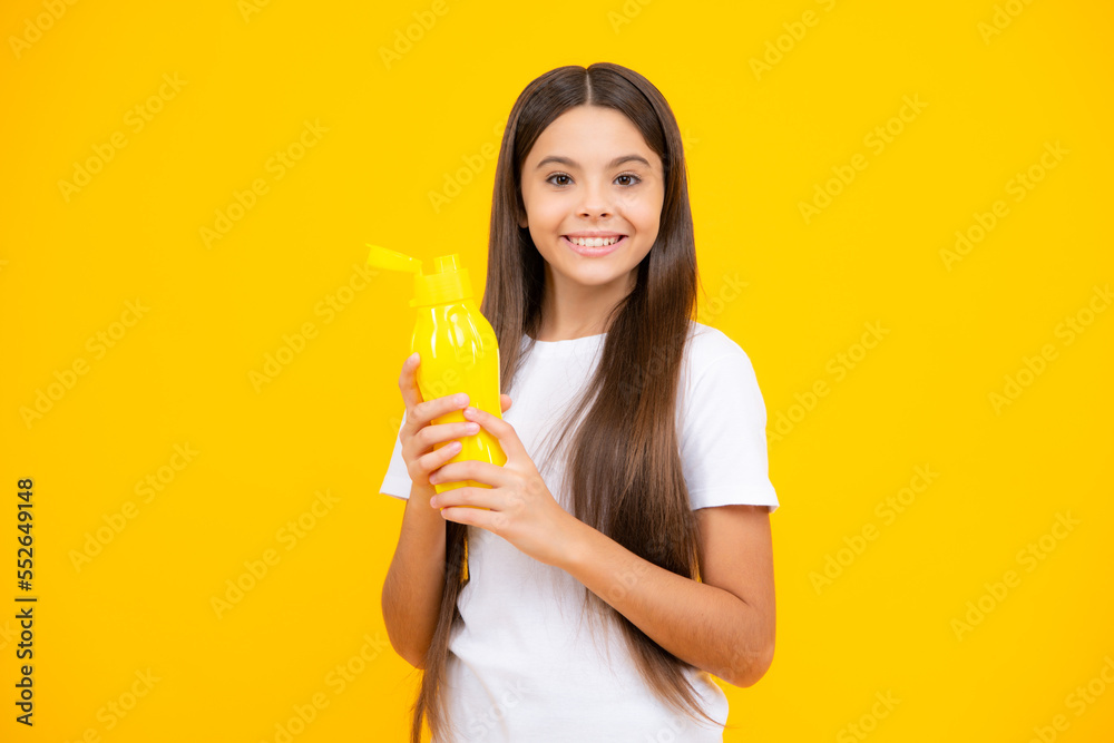 Girl teen hold water bottle. Water bottle and healthy life. Health and water balance. Drink and beverage concept. Happy teenager portrait. Smiling girl. Girl teen hold water bottle. Water bottle and healthy life. Health and water balance. Drink and beverage concept. Happy teenager portrait. Smiling girl.