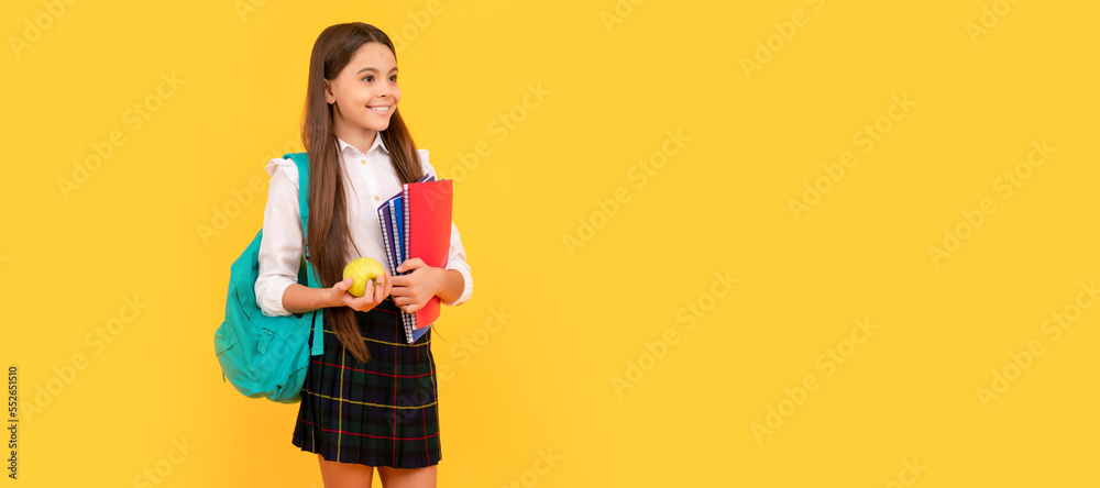schoolgirl with apple and backpack. back to school. teen girl ready to study. Portrait of schoolgirl student, studio banner header. School child face, copyspace. schoolgirl with apple and backpack. back to school. teen girl ready to study. Portrait of schoolgirl student, studio banner header. School child face, copyspace.