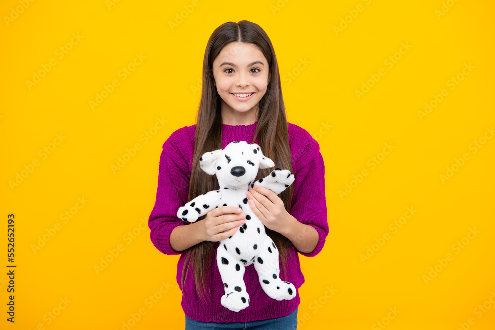 Cheerful teen child hold toy. Happy childhood. Kid playing toy. Childcare concept. Cheerful teen child hold toy. Happy childhood. Kid playing toy. Childcare concept.