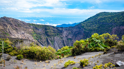 panorama of volcano irazú in costa rica, volcanic landscape of Irazú Volcano National Park, mighty volcano in clouds in costa rica mountains photo