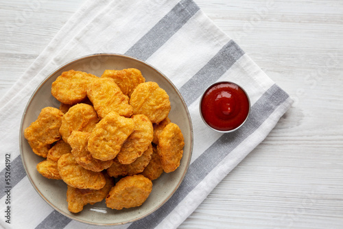 Homemade Chicken Nuggets with Ketchup, top view. Flat lay, overhead, from above. Space for text. photo