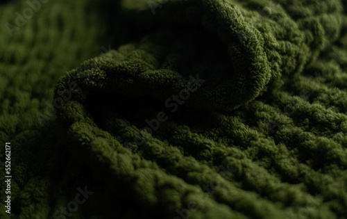 Obraz na płótnie Monochrome background of cozy green knitted sweater w salonie