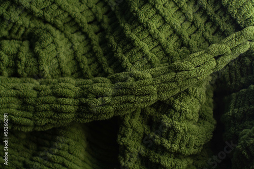Obraz na płótnie Monochrome background of cozy green knitted sweater w salonie
