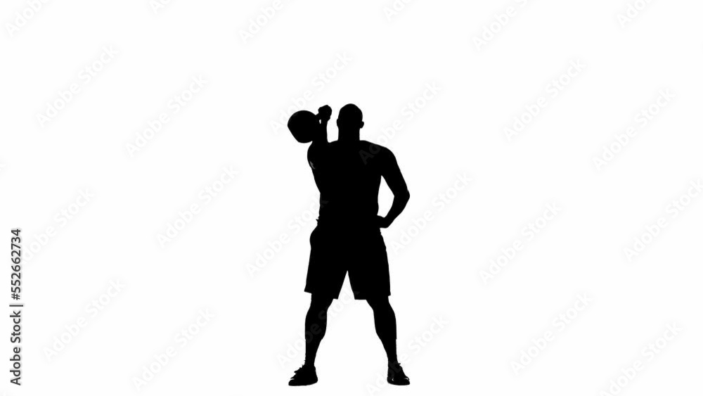 Black silhouette of muscular man lifting kettlebell. Bodybuilder doing exercises for back, shoulder, biceps, abdominal muscle. Powerlifting or crossfit workout on white studio background, full length.