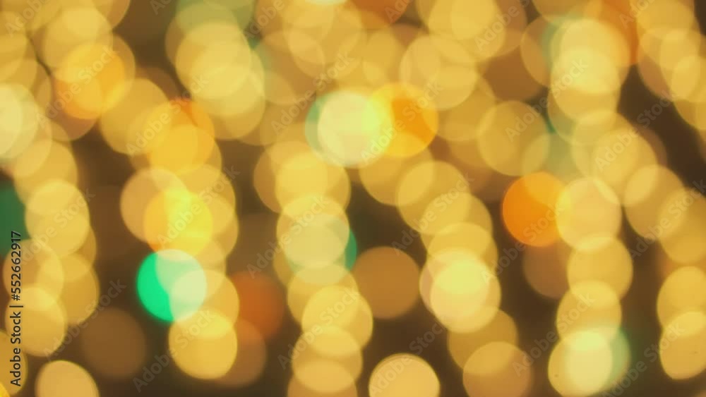 Light bokeh background from a Christmas tree. Out of focus decor, theme and concept winter background. Blurry fairy-tale New Year's light. Shimmering abstract colored circles defocused holiday lights. Light bokeh background from a Christmas tree. Out of focus decor, theme and concept winter background. Blurry fairy-tale New Year's light. Shimmering abstract colored circles defocused holiday lights.