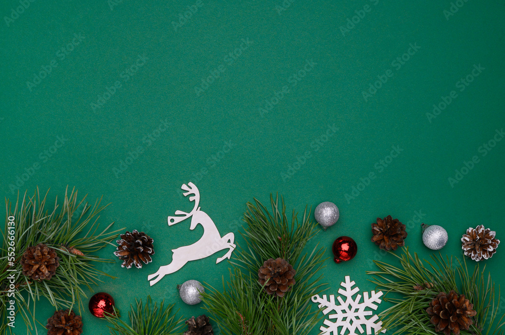 Christmas, New Year composition. Frame on a green background.Christmas, winter, new year concept.Flat lay, top view.