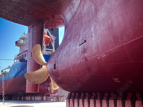 Fotografija Ships propeller survey during dry docking of a vessel