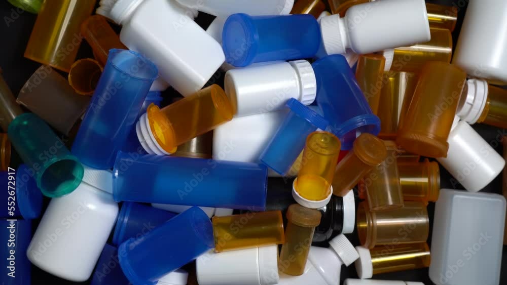 Stockvideon Medical waste. Empty pills bottles or packs for medications