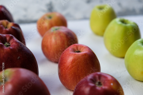 Green and red apples close up. Juicy fruits. Useful snack. Vegetarian food. Delicious, healthy snack. Vitamins, microelements. Fat burning. copy space	