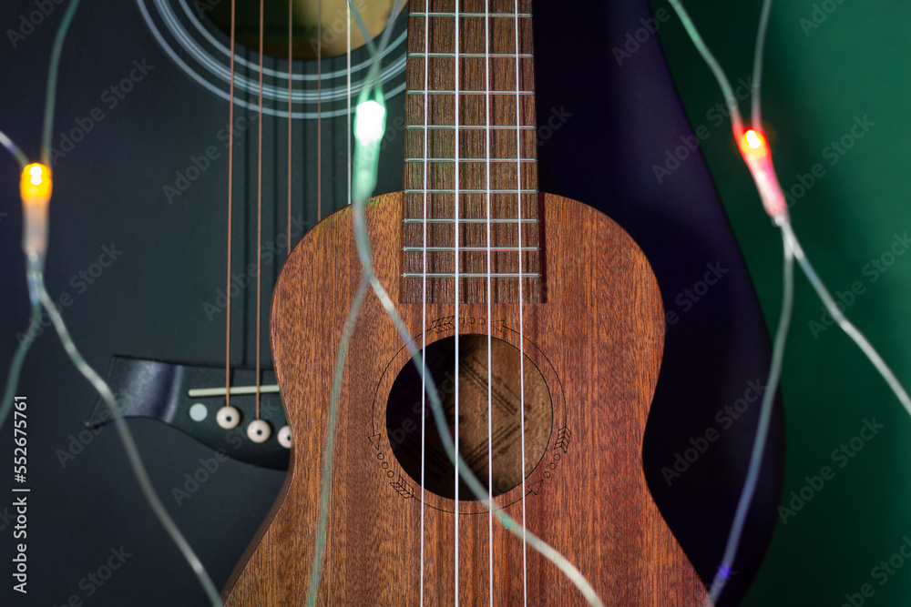 Fototapeta premium New Year sale of guitars and string instruments