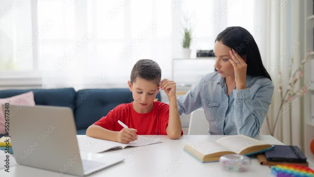 Mother and son having difficulty with school homework, challenging math problem Mother and son having difficulty with school homework, challenging math problem