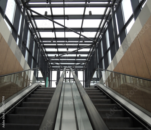 Two underground stairs escalators to the car parking on the roof of the business center 