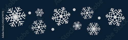 Snowflakes border. White snowflakes on a dark blue background.