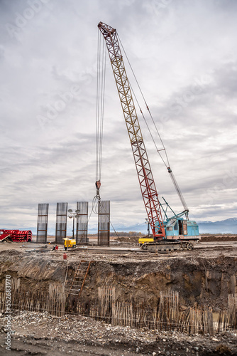 Monolithic structural elements and scaffolding at bridge construction.