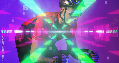 Caucasian male athlete wearing helmet and glasses riding bike over illuminated abstract patterns
