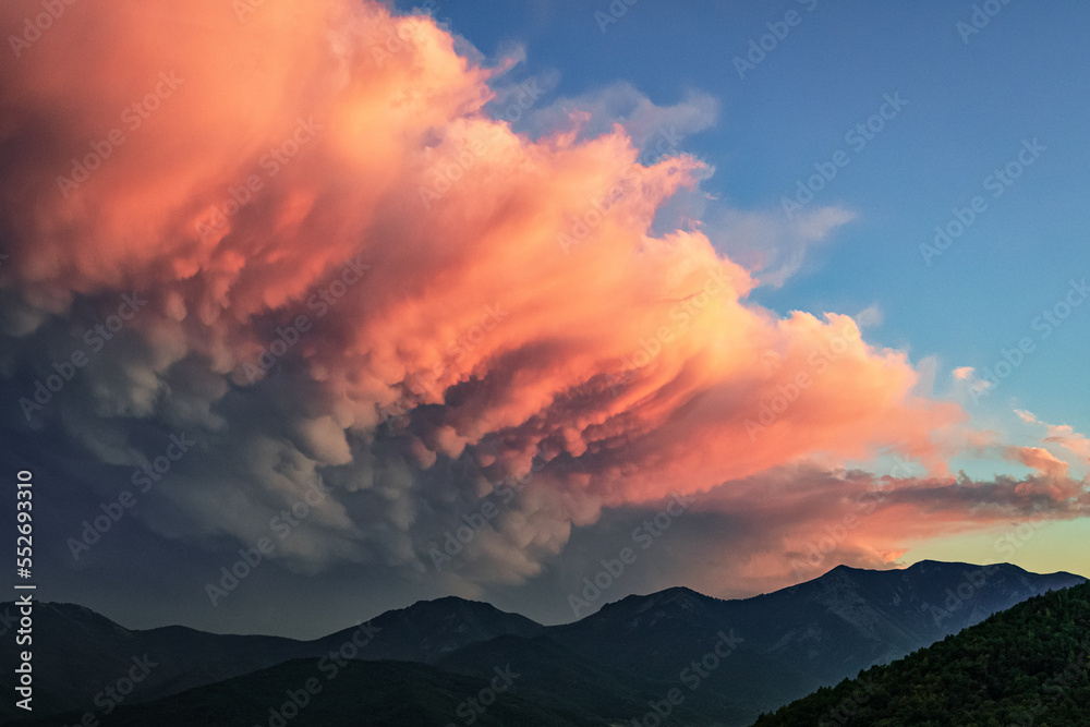 The incredible sunset seen from Valgioie (Valsangone, North-West of Italian Alps) on 7th August 2022. The clouds had unbelievable shapes and color tones. Valgioie, Piedmont, Italy