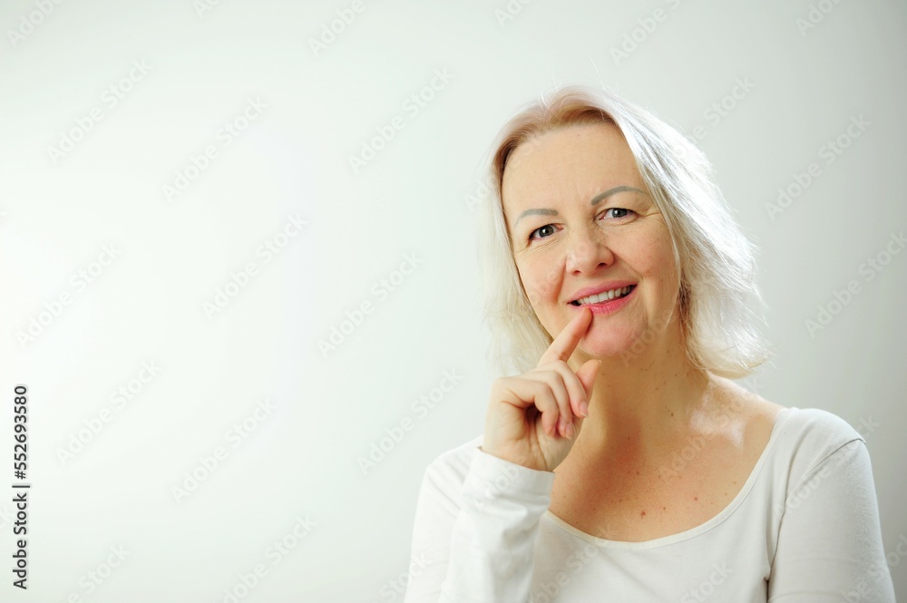 Cheerful happy adult beautiful girl looking at camera smiling laughing over white background Beautiful candid woman with short hair and without makeup smiling, standing in t-shirt Cheerful happy adult beautiful girl looking at camera smiling laughing over white background Beautiful candid woman with short hair and without makeup smiling, standing in t-shirt