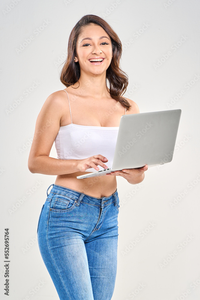 young woman with laptop casual outfit