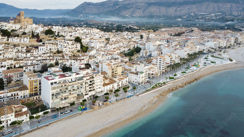 Altea, Spain - December 07, 2022: Aerial view of the renovated coastline and its beach of the town of Altea in Alicante, Spain