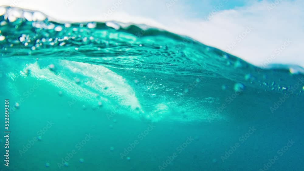 Woman surfs the wave in the Maldives Woman surfs the wave in the Maldives