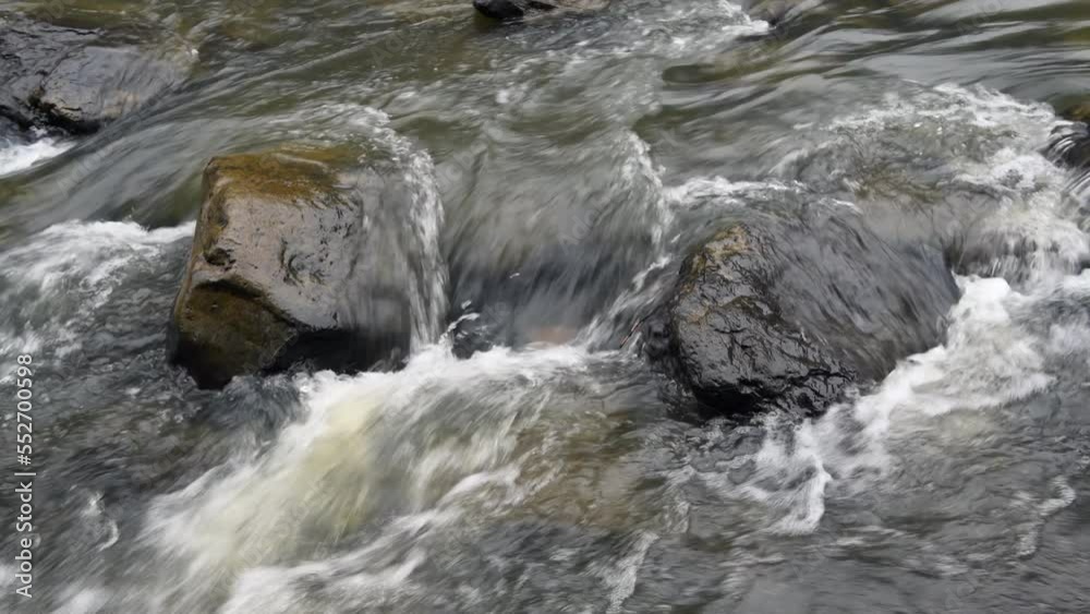 Water flowing through a rocky river in Cumberland Mountain Tennessee shows the peaceful, surreal tone of being in the wilderness. Water flowing through a rocky river in Cumberland Mountain Tennessee shows the peaceful, surreal tone of being in the wilderness.
