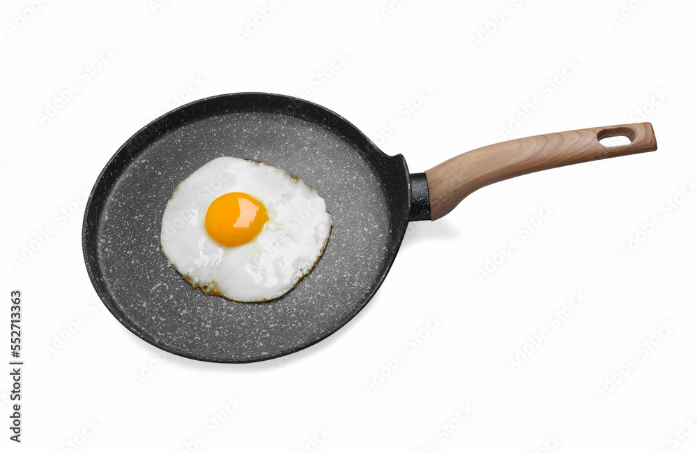 Frying pan with delicious fried egg isolated on white Frying pan with delicious fried egg isolated on white