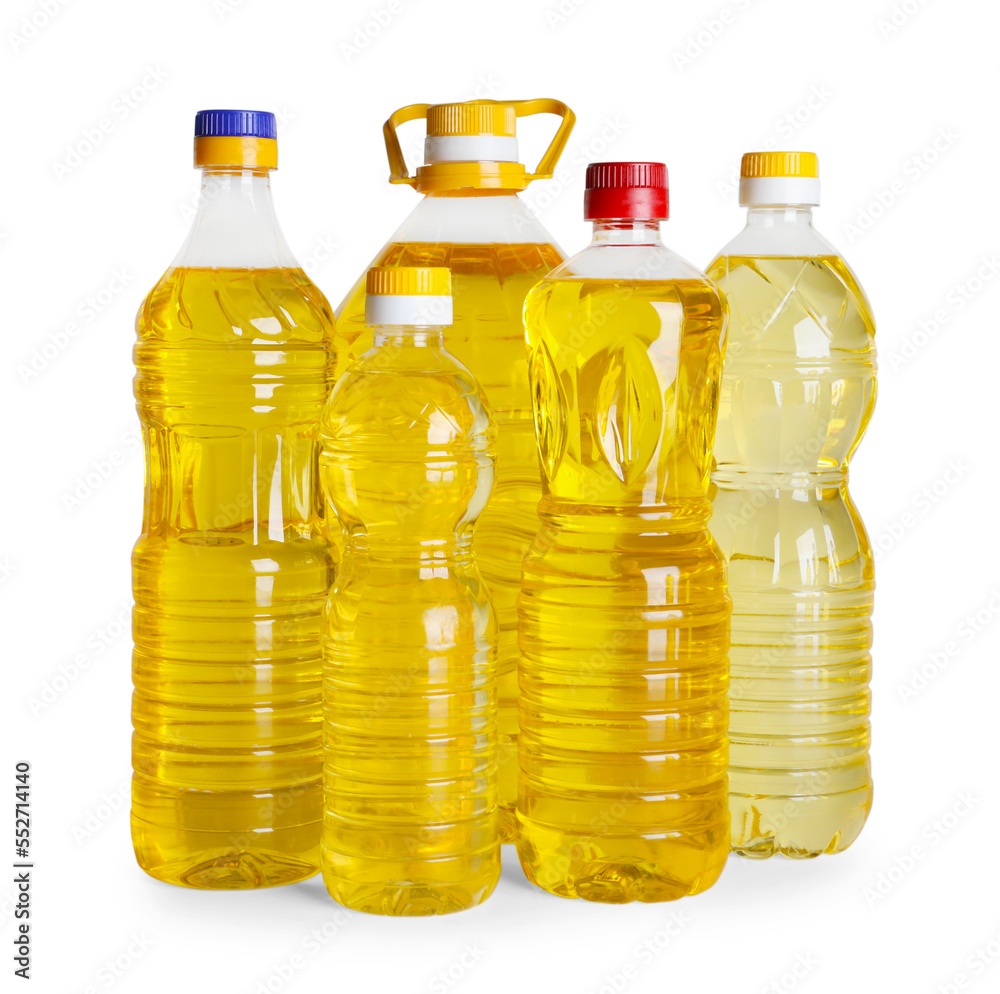 Bottles of cooking oil on white background Bottles of cooking oil on white background