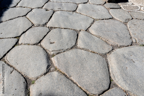 A beautiful typical cobbled street in an ancient Roman city, Italy