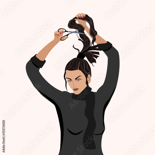 An Iranian woman in a hijab cuts off her hair. Women's protest in Iran.
