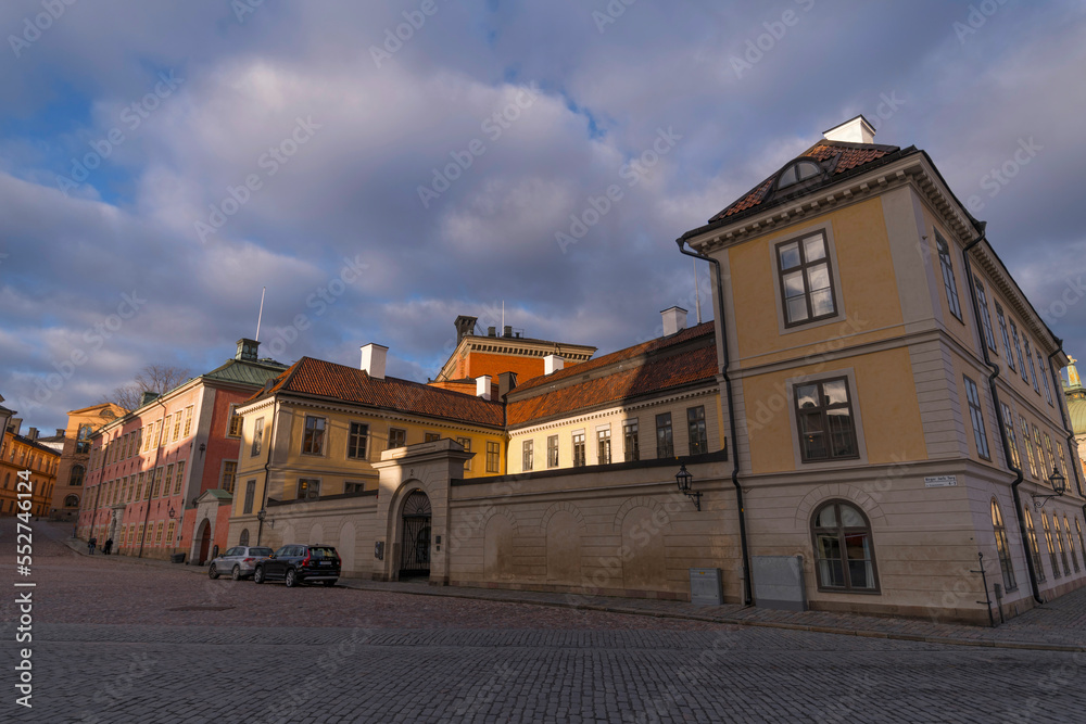 Old archive and court houses a winter day with dark clouds and low sun in Stockholm