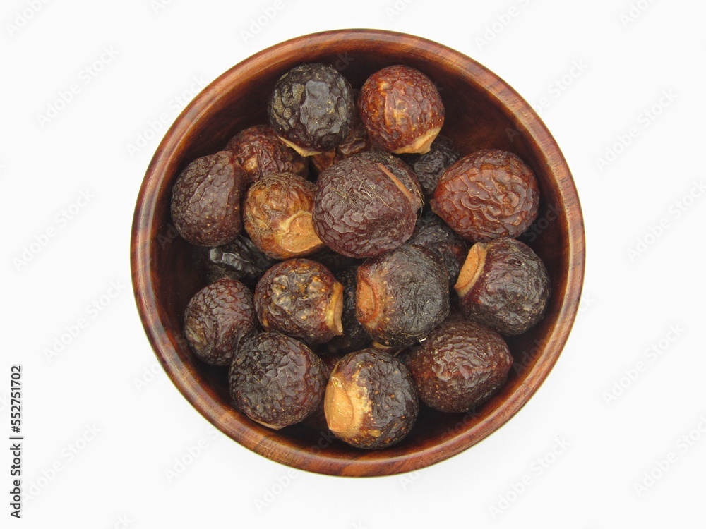 Fototapeta premium Indian soapberry in a bowl on white background 