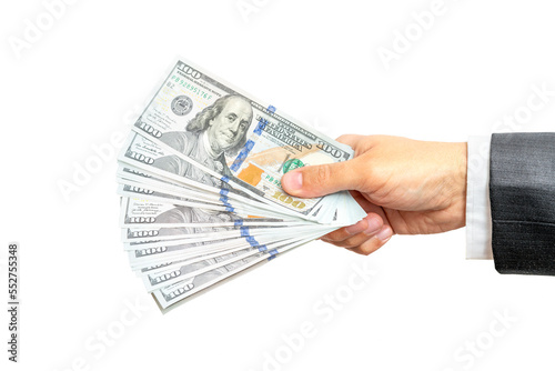 Businessman holding fan of crisp new dollar bills up on white background. American cash, money in hand