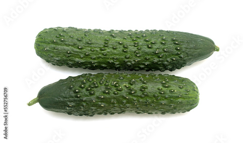 Green cucumber on a white background.