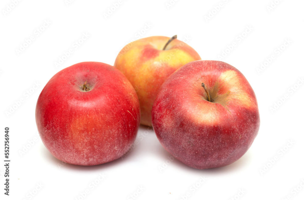 Ripe apples on a white background.