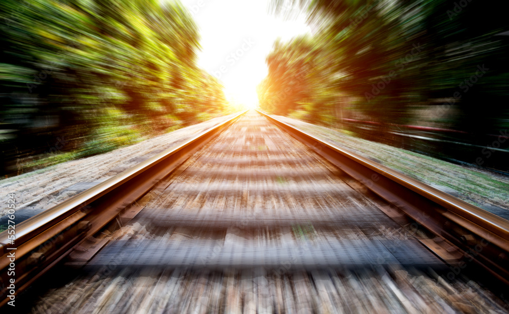 Blurred railroad in motion at sunset Blurred railroad in motion at sunset