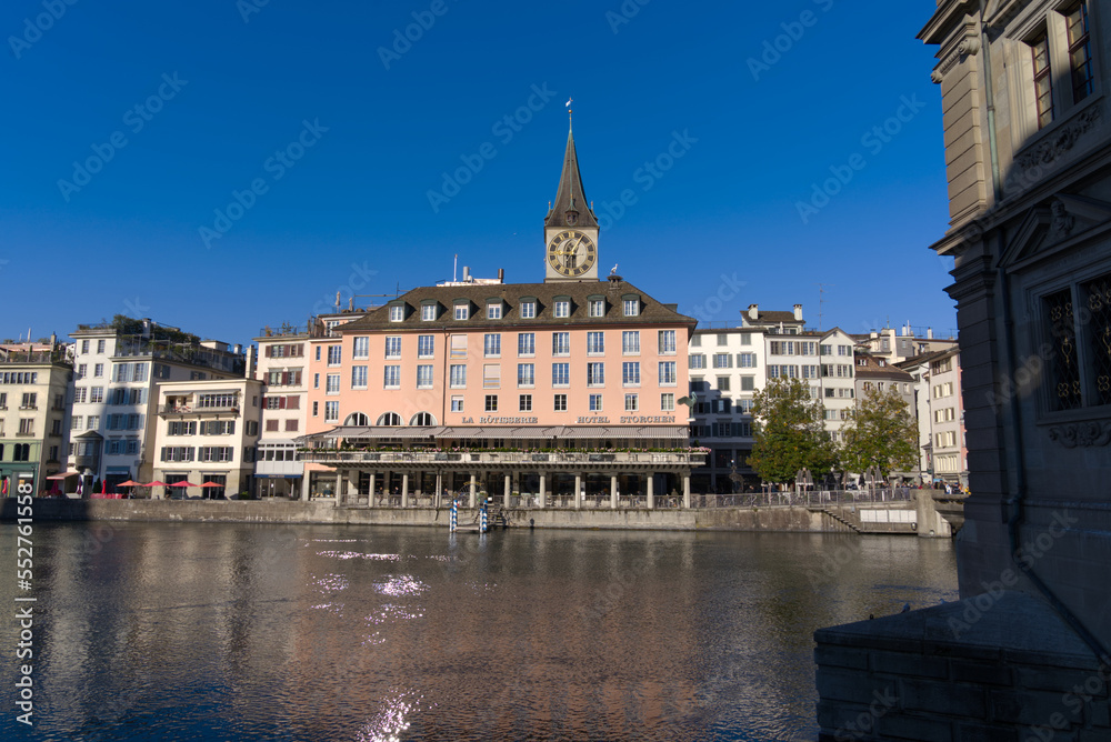 Beautiful cityscape of the old town of Zürich with Limmat River in the foreground on a sunny late summer morning. Photo taken September 22nd, 2022, Zurich, Switzerland.