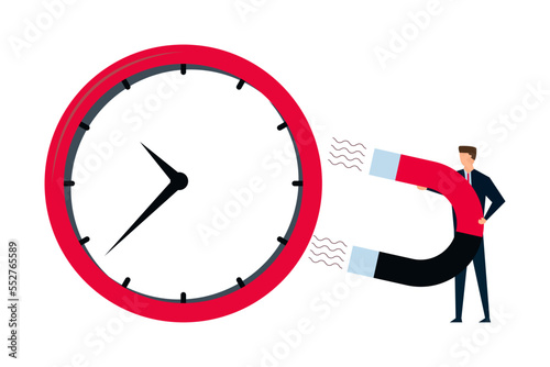 Time management, smart businessman using magnet to stop clock hand metaphor of time manipulation.