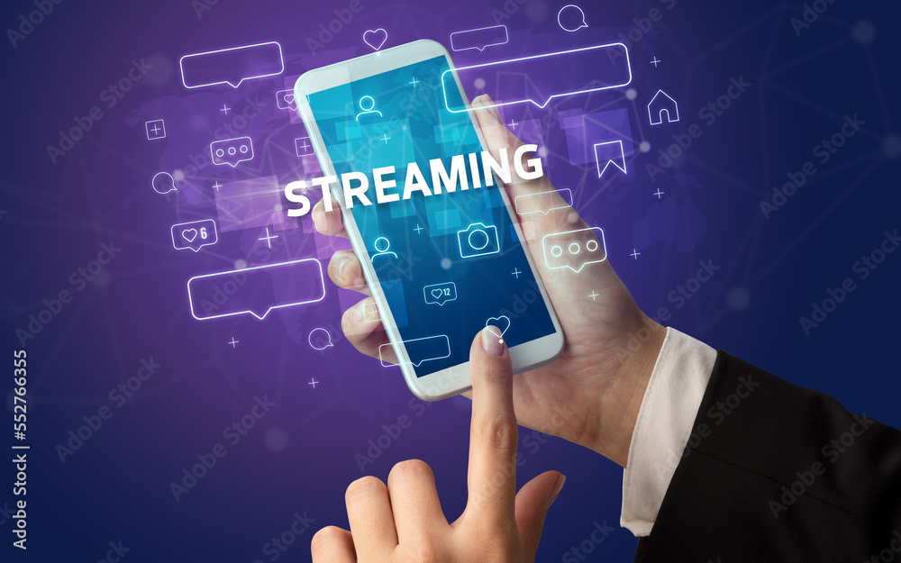 Hand using smartphone with social media concept Hand using smartphone with social media concept