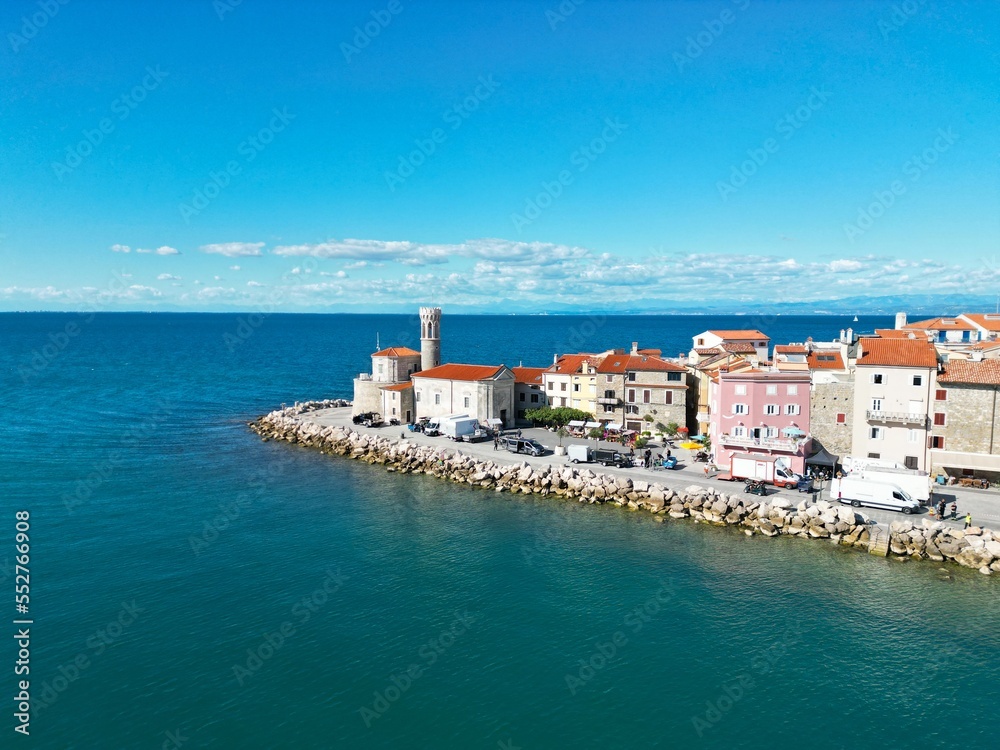 Piranski svetilnik lighhouse Piran Slovenia on sunny day drone aerial view.. Piranski svetilnik lighhouse Piran Slovenia on sunny day drone aerial view..