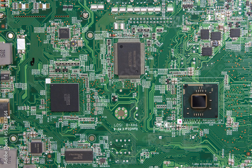 Details of electronic board. Close-up of electronic circuit board with SMD components, microcircuits and chips