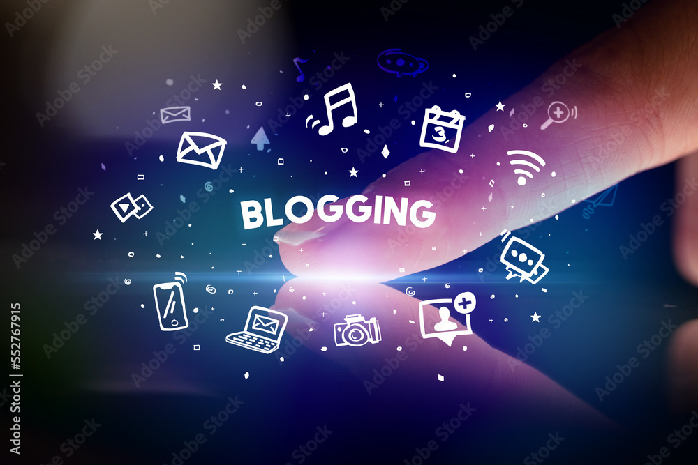 Finger touching tablet with social media icons concept