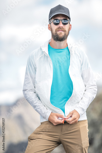 Portrait of a man wearing sports glasses and with a beard © michelangeloop