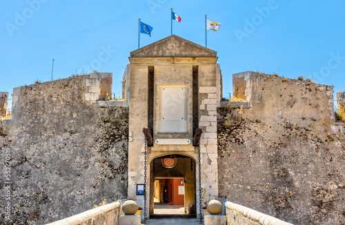 Main gate and defense walls of XVI century Citadel castle in historic old town of Villefranche-sur-Mer resort town in France