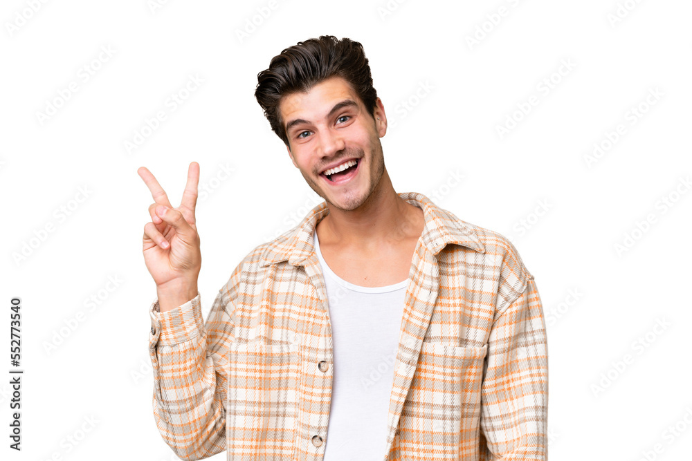 Young handsome caucasian man over isolated background smiling and showing victory sign Young handsome caucasian man over isolated background smiling and showing victory sign