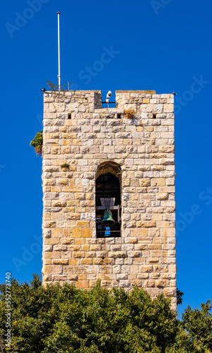 Tour Sarrazine Grimaldi Tower aside Cathedral in historic old town of Antibes resort city onshore Azure Cost of Mediterranean Sea in France photo