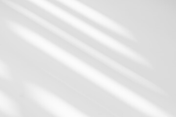 Gray shadow and light blur abstract background on white wall  from window.  Dark grey shadows indoor in room  background, monochrome, shadow overlay effect for backdrop and mockup design